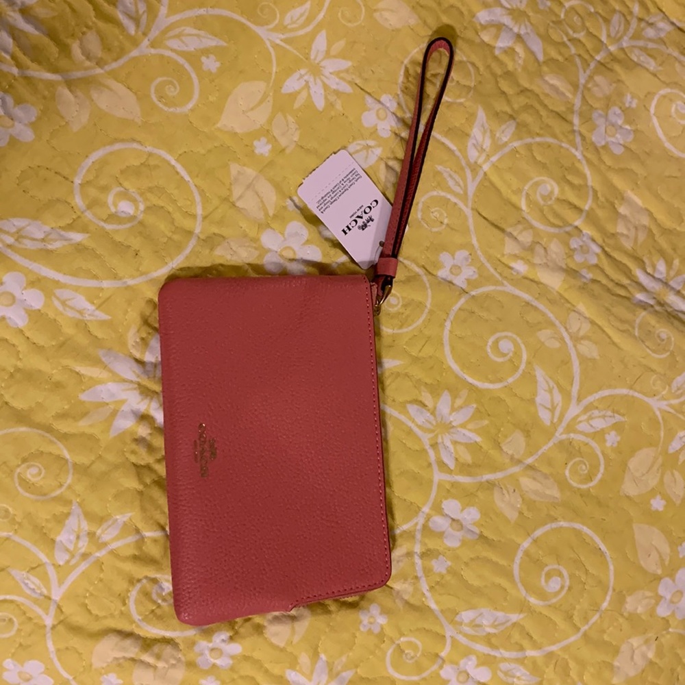 Coach wristlet-coral color